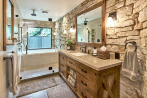 Rustic bathroom with stone walls