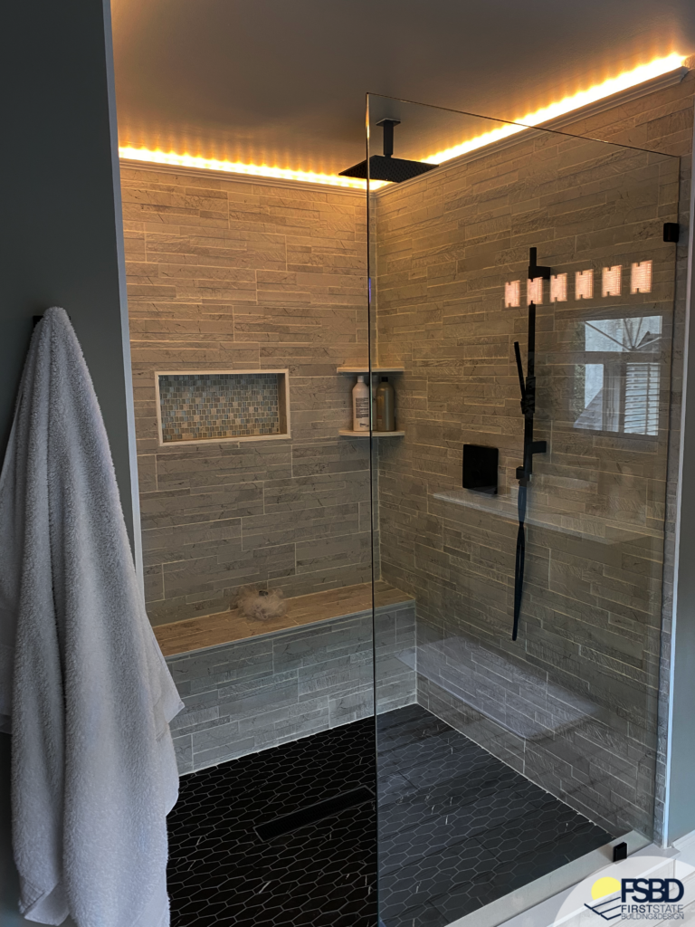 Large tiled shower with classic lighting