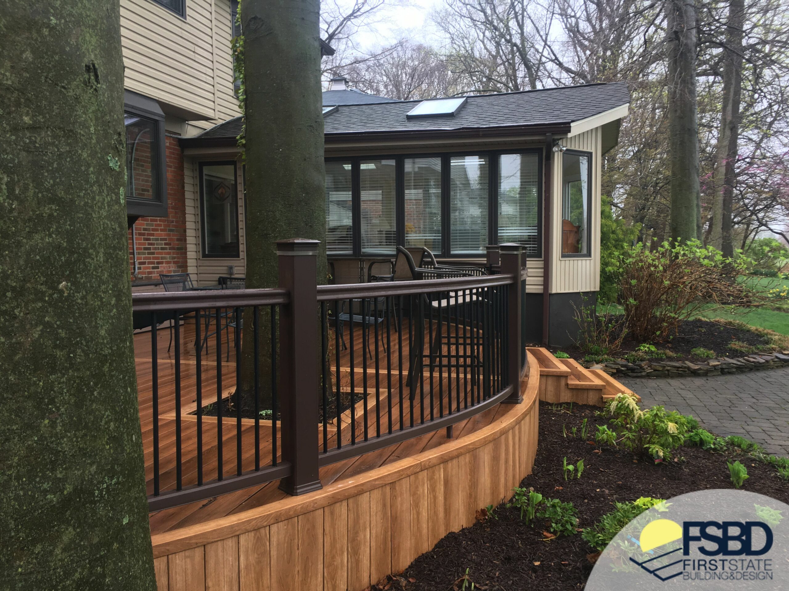 Custom curved composite deck with railing