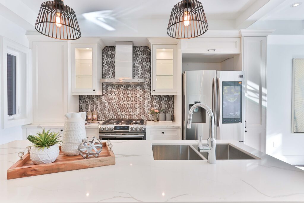 Traditional kitchen with white cabinets and countertops