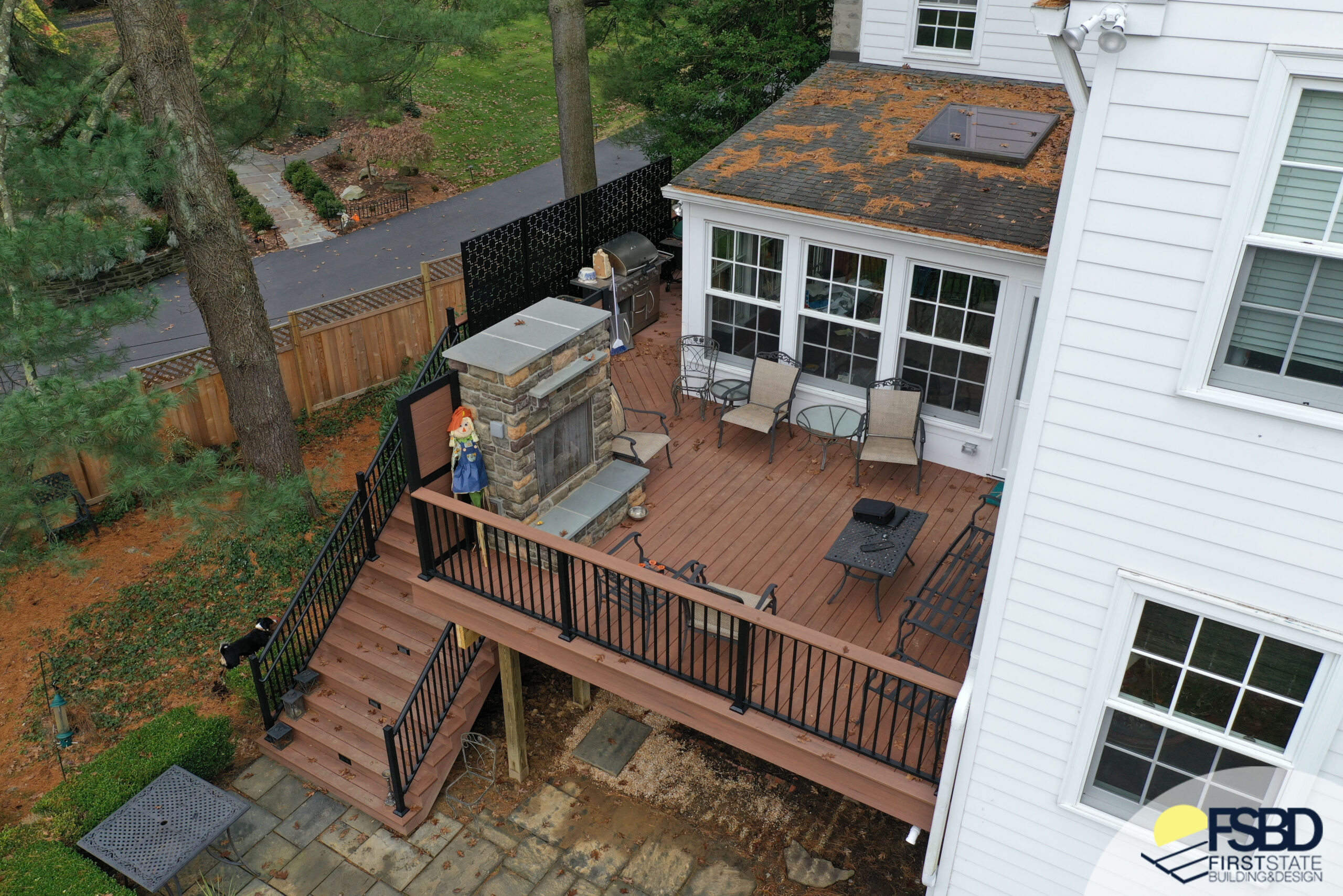 Aerial view of outdoor fireplace on deck