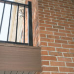 1005-04 Deck attached to Brick Wall